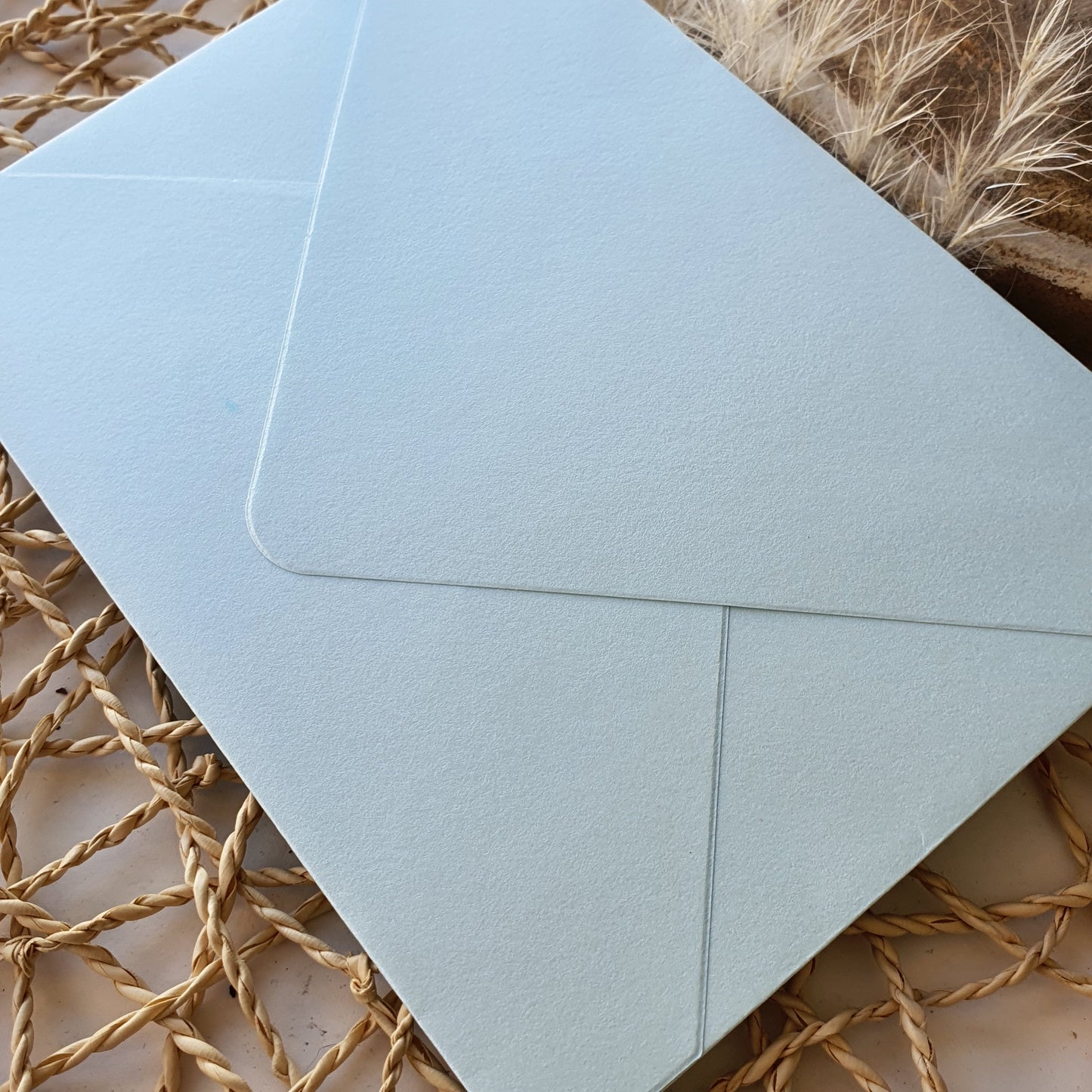 Envelope azul celeste com brilho