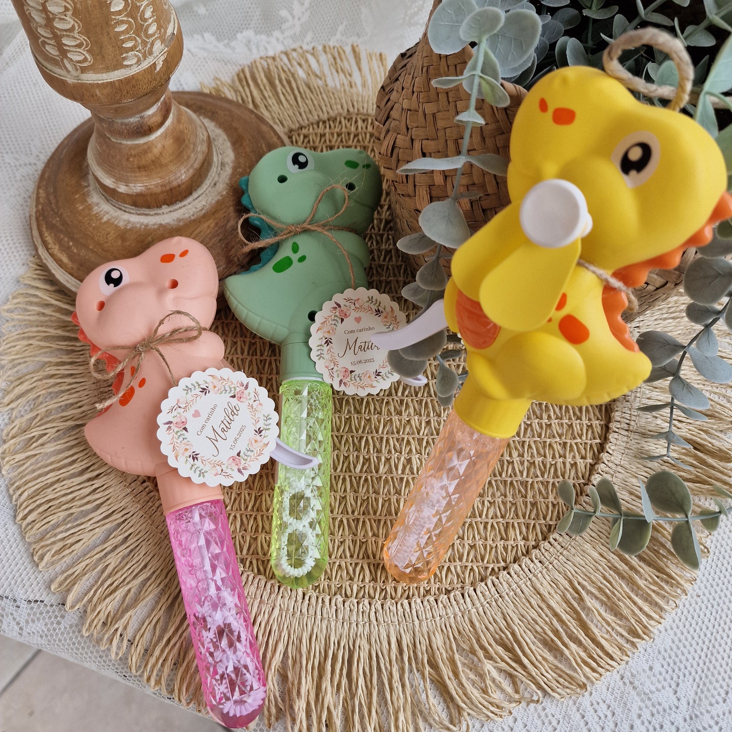 Dinossauro ventoinha e bolinhas de sabão