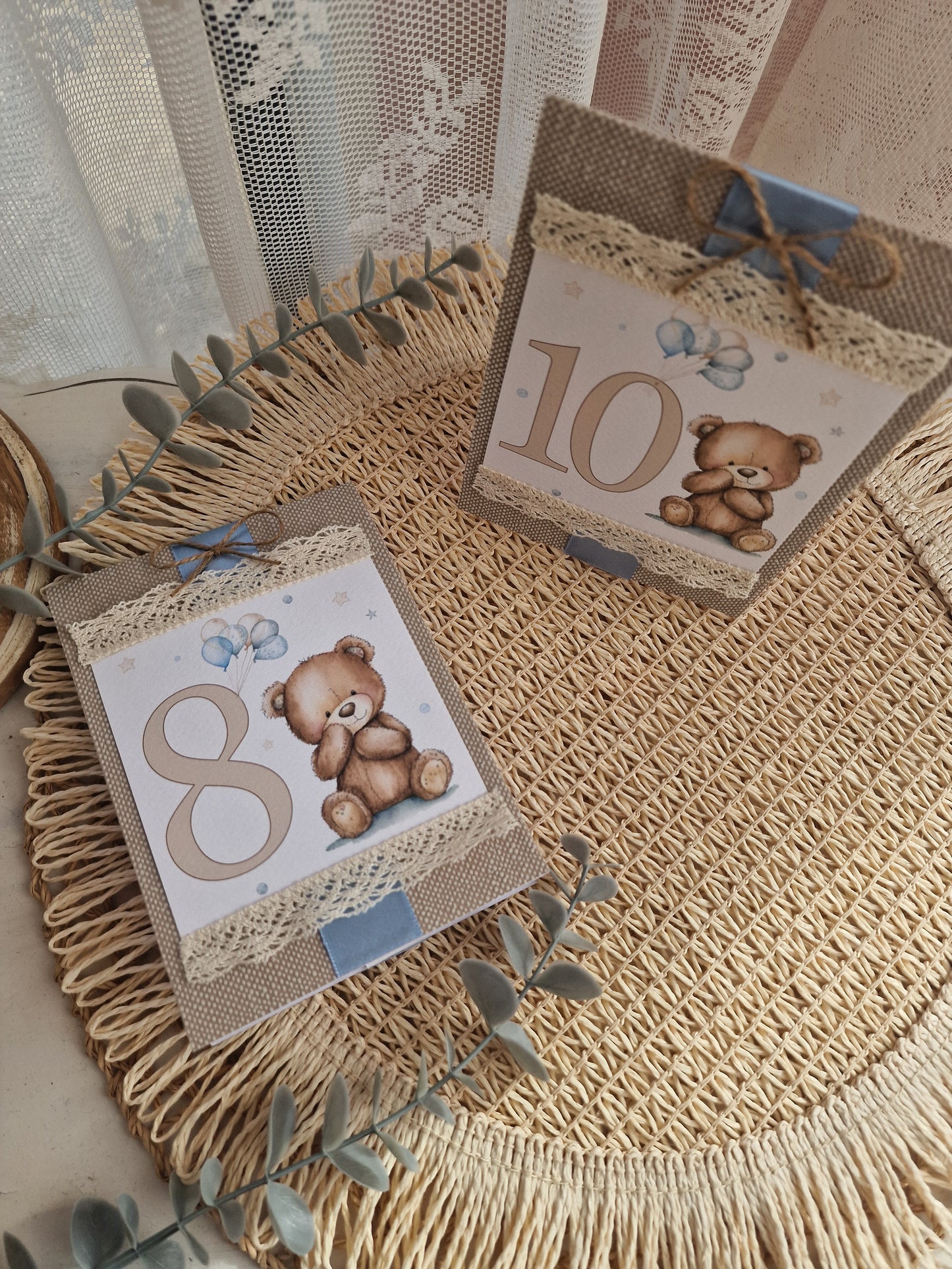 Blue teddy bear table marker with base